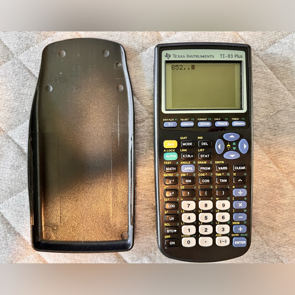 Texas Instruments TI-83 Plus Graphing Calculator Works Great New Batteries